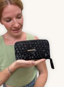 Handmade fish leather wallet, black Nile perch leather exterior, traditional Turkana fabric interior, handcrafted in Kenya