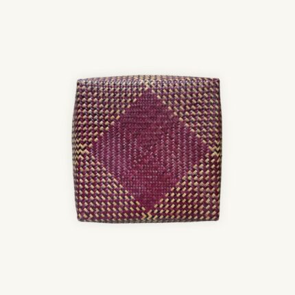 Handwoven Krajood seagrass lidded box in deep magenta and gold pattern, approx. 28 × 28 × 8 cm, handmade in Thailand - So Rare Pieces.