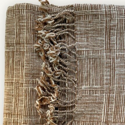 Handspun cotton in deep cacao and natural tones, hand-woven in Northeastern Thailand by women-led weaving groups. Plant-dyed. 80 × 200 cm.