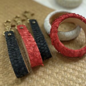 Red and black Fish Leather Keyfobs and Bangles with open scale structure presented by SoRarePieces