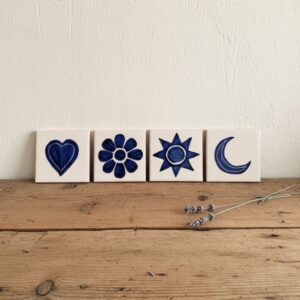 Handpainted azulejo set of 4 - sun, flower, moon leaned against a wall - presented by SoRarePieces