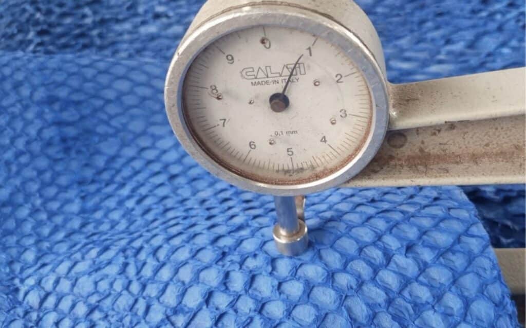 Measuring the thickness of Ambani Nile perch leather with a thickness gauge
